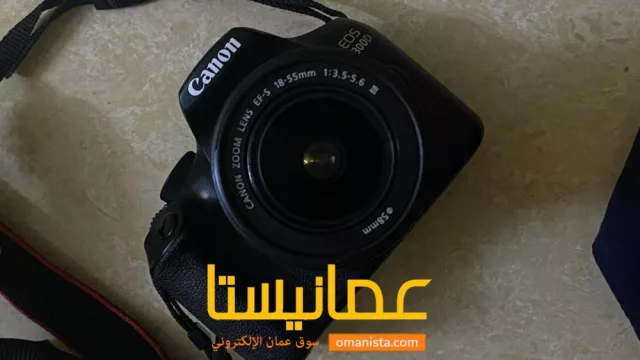 معي كاميرا كانون Canon EOS 1300D بحالة جيده جدا مع العدسة