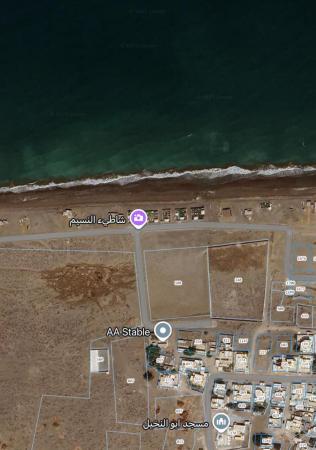 ارض سياحيه للبيع اول خط