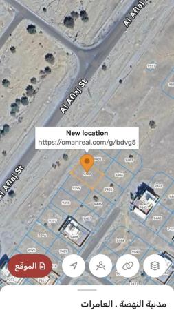 العامرات مدينة النهضة مربع 14اول خط على الشارع الرئيسي