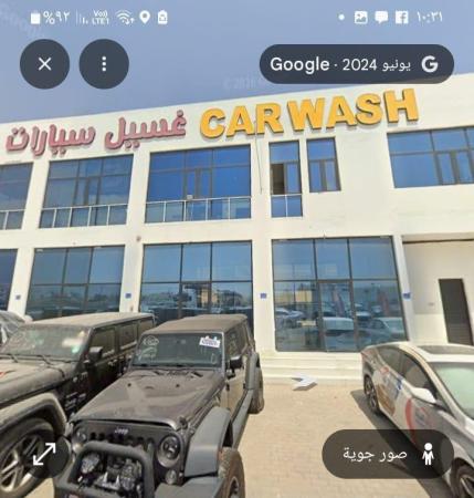 للايجار مبنى صناعي وسكني مع غرف ومحلات ومغسلة في المعبيلة